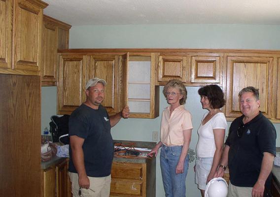 Jeromy Smith, Smith Woodworking, shows off his beautiful kitchen cabinetry to USDA Marietta Area Director Carol Costanzo, Barbara Conover, CEO of Three Rivers, and Tony Logan, Rural Development State Director.