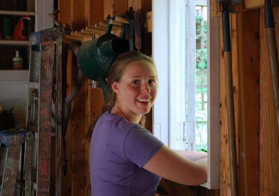 Alison Fritz is all smiles in her hobby as a beekeeper, among the youngest in the DC area." 