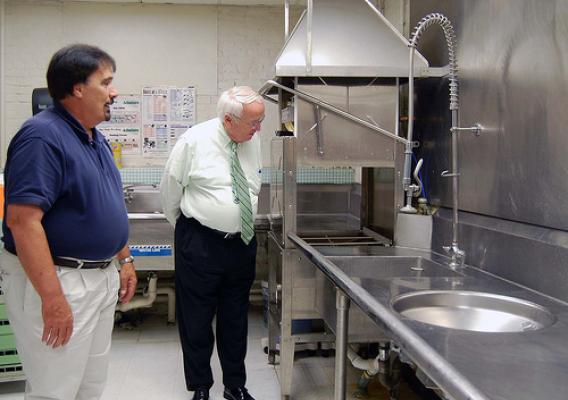 FNCS Under Secretary Kevin Concannon looks at the new dish machine bought with ARRA funds at Walker Elementary School in Concord, NH.