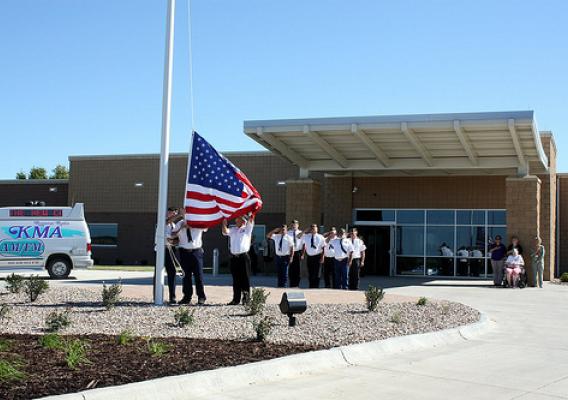 The Flag is raised in front of a new hospital in Missouri, funded with support from USDA Rural Development