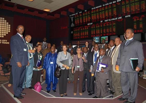The African ministers of commerce, trade, and agriculture on the trading floor of the Kansas City Board of Trade.