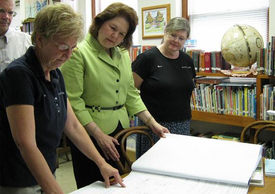 Administrator Canales, the Mayor and Library officials review the plans for the future Pawnee City Public Library. The building is being funded with USDA Recovery Act support.