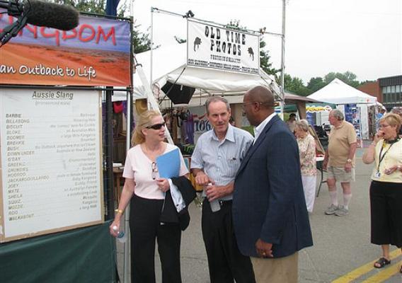USDA Rural Development State Director for Maine Virginia Manuel and Farm Services Agency State Director Donovan Todd (center) give Ambassador Ron Kirk a tour of the Bangor State Fair.