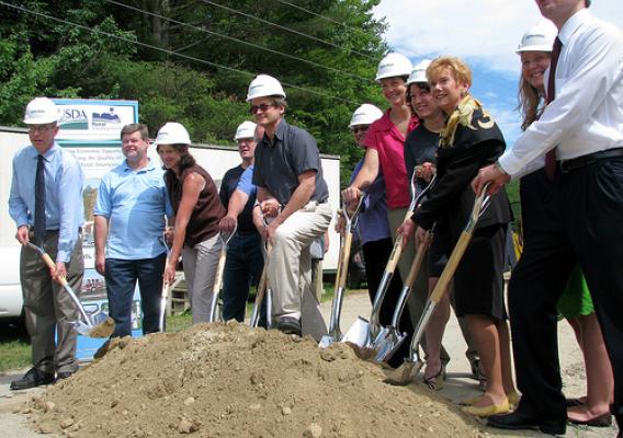 USDA Community Programs Director Rhonda Shippee, third from left, representatives from the offices of U.S. Senators Gregg and Shaheen, Congressman Hodes, state and local officials, and contractors from the MacMillin Company gather for a groundbreaking at the Peterborough, NH wastewater treatment plant.  