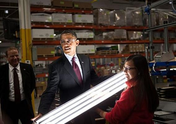 President Barack Obama watches as an operator demonstrates the final stage of light fixture assembly during a tour of Orion Energy Systems, Inc in Manitowoc, Wisc., Jan. 26, 2011. (Official White House Photo by Samantha Appleton) 