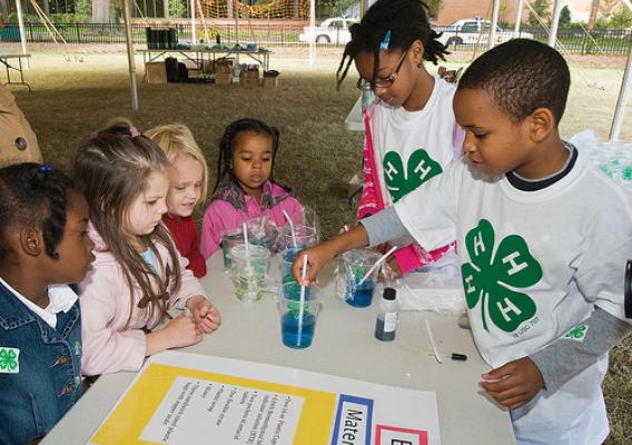 Charles Johnson and Alyssa Campbell fifth grade students demonstrate the effects of carbon dioxide on the atmosphere and what we can do to replace our carbon footprint at Hearst Elementary School in Washington, DC. The experiment was part of the 4-H National Youth Science Day, National Science Experiment, 4-H2O, Tuesday, October 6, 2010.