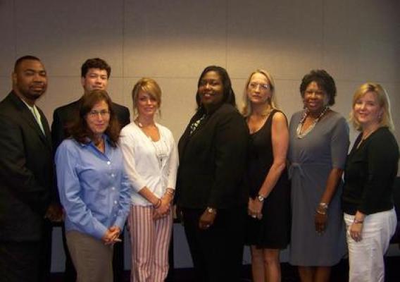 Mississippi Rural Development State Director Trina N. George (center) stands with Congressional staff members who participated in a recent briefing on Rural Development 2010 programs.