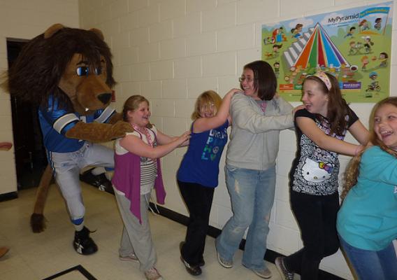 Detroit Lions mascot Roary does the Locomotion with students at Sandburg Elementary School in Waterford, MI.