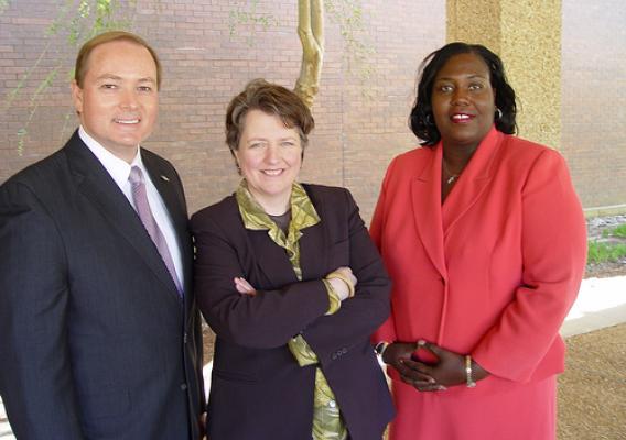 Deputy Secretary Merrigan is greeted at Mississippi State University by President Mark Keenum (left) and USDA Rural Development State Director Trina George.