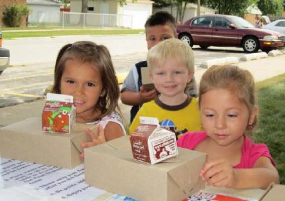 Children in Cook County, Illinois, enjoy a nutritious summer meal from the Greater Chicago Food Depository’s Lunch Bus.