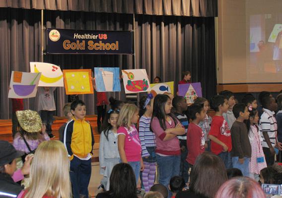 Students at Minshew Elementary School celebrated the receipt of the gold award in the HealthierUS School Challenge by singing about healthy foods.