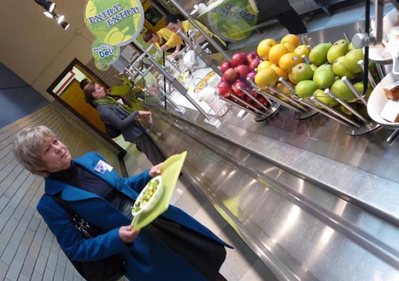 Christie Vilsack samples a healthy, made-to-order salad from Von Steuben High School’s revamped cafeteria line. 
