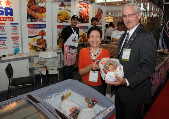 Acting Under Secretary for Farm and Foreign Agricultural Services, Michael Scuse, meets with Magaret Say of the USA Poultry Export Council's Singapore office at the 11th Food and Hotel Indonesia show in Jakarta April 6. As part of the U.S. Agribusiness Trade and Investment Mission to Indonesia this month, Scuse helped open the show, toured the floor and met with U.S. exhibitors. (Photographer, Rifky Suryadinata, U.S. Embassy, Jakarta)