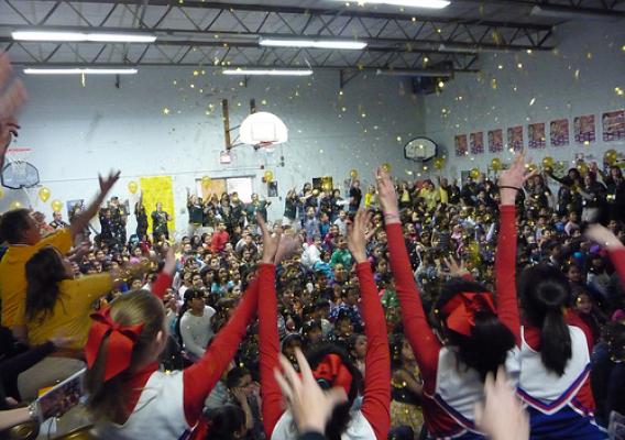 A recent USDA HUSSC event featured a rousing finale in which the entire gymnasium-filled with jumping and cheering students, teachers, administrators and partners- were showered with gold confetti.    
