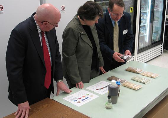 Michigan State University Professor Dr. Bruce Dale (right) display samples of treated cellulosic ethanol materials to Agriculture Deputy Secretary Kathleen Merrigan (center) and USDA Rural Development State Director for Michigan James J. Turner.   