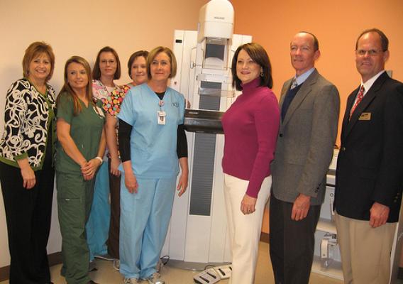 Evans Memorial Hospital staff with a new, USDA funded mammography machine  L to R: From Evans Memorial Hospital: Martha Tatum, CEO; Shelley Kicklighter; Angie Smiley, Tammie Eason, and Wendy Boatright. From Rural Development Jeanmarie Deloach, Donnie Thomas, acting state director,  and Ricky Sweat, Baxley area office director.