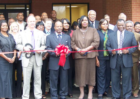 Over 100 people gathered for the ribbon-cutting ceremony of the Greater Refuge Community Center, which was financed by a USDA loan. (State Director Trina N. George, front row, third from right) 