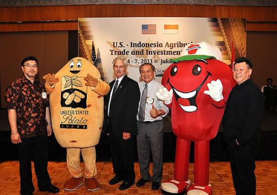 Acting Under Secretary Scuse stands with representatives from U.S. agricultural cooperators at the Food and Hotel Indonesia show on April 5. (Photographer, Rifky Suryadinata, U.S. Embassy, Jakarta)