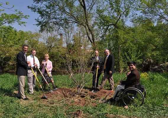 USDA NRCS and local officials plant a tree.  Earth Day, April 22, was founded by former U.S. Sen. Gaylord Nelson of Wisconsin and was first celebrated in 1970. Earth Day continues to be celebrated throughout the country.