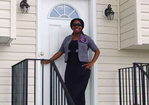 Latia Reed, in front of her new home in the Shippensburg Self-Help Housing Development on move-in day. USDA supports homeownership efforts through a variety of programs.  