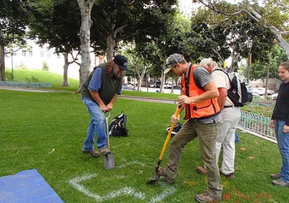 Kit Paris and Randy Riddle with the USDA Natural Resources Conservation Service are taking soil samples in downtown Los Angeles. (NRCS photo)