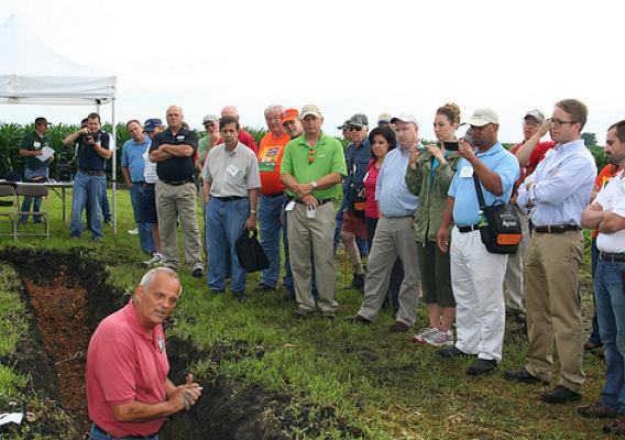 NRCS Soil Scientist Roger Windhorn shows participants the differences in soil layers and what makes a healthy soil.