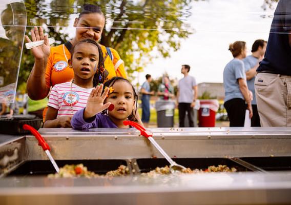 Families sample local foods and learn about healthy options at the Minneapolis Public Schools third annual Farm to School Community BBQ.