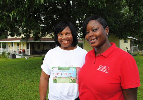 Beverly Robinson, left, has worked with NRCS District Conservationist Vontice Jackson to make conservation improvements to her goat farm.