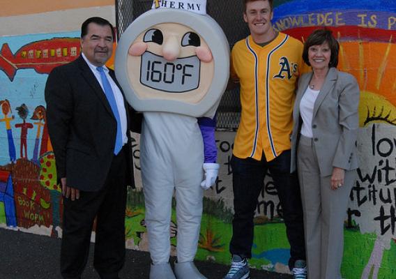 Deputy Under Secretary for Food Safety Alfred V. Almanza, California Department of Agriculture Secretary Karen Ross, and Oakland A’s player Mark Canha visited a California elementary school to teach students about food safety. 