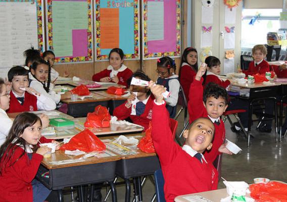 Students eating breakfast in classroom