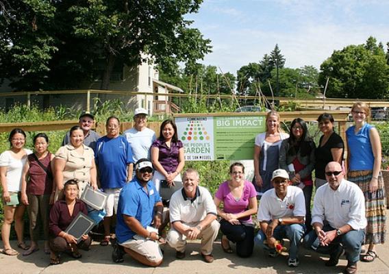 USDA staff and gardeners gathered to dedicate the community garden at Common Bond Communities Torre De San Miguel homes in St. Paul, Minn.