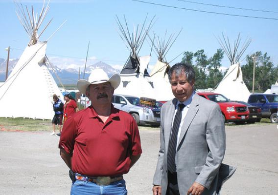 Ross Racine, Intertribal Agriculture Council executive director, and Undersecretary Ed Avalos, attend the 60th Annual North American Indian Days Celebration on the Blackfeet Reservation in Montana on July 8.
