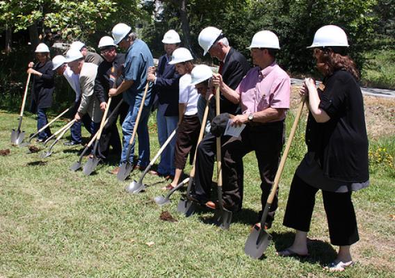 Fundamental project partners and community supporters participate in ceremonial groundbreaking. 