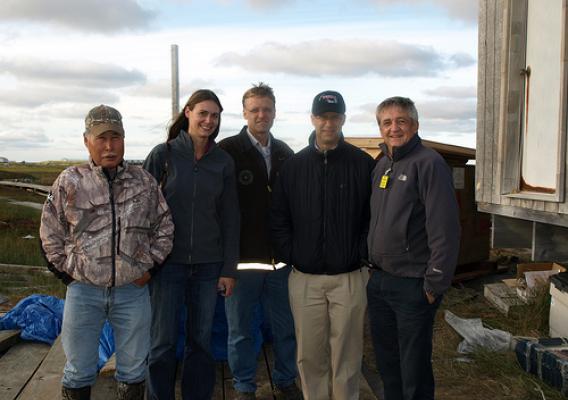 Left – Right, President of the Village of Kwigillingok, Johnny Friend, joins Tasha Deardorff, Matt Dixon, Jonathan Adelstein and Jim Nordlund at a site where RAVG funded a flush, tank and haul upgrade for a village home.