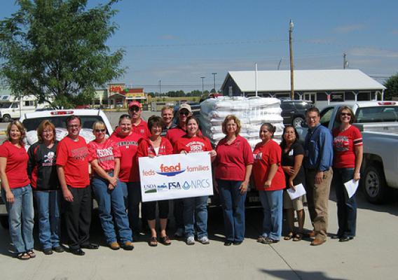 Pictured are the group of employees who participated in the ‘Feds Feed Families’ food drive. Noting second from left is County Executive Director Barb Cross, Farm Services Agency.  Third from left is Executive Director John Berge, National Food and Ag Council.  Pictured  second row at left is NRCS District Conservationist Dallas Johannsen and NRCS Major Land Resource Area Soil Survey Office Leader Tim White, middle.  Pictured far right is Area Director Brenda Darnell, USDA Rural Development.