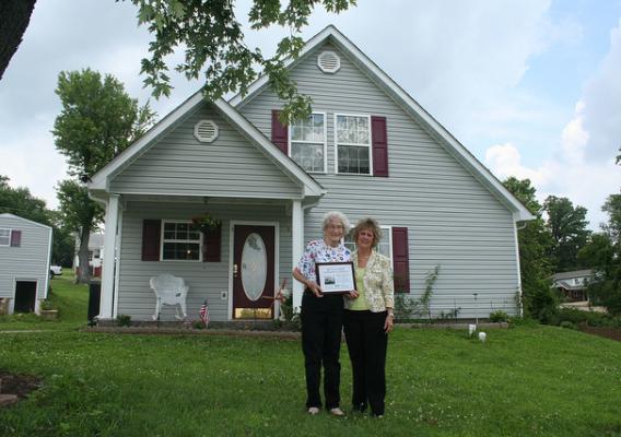 Homeowner Rita Fincher and  Missouri State Director Anita J.(Janie) Dunning in front of Ms Fincher’s new house