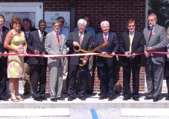 The ribbon cutting photo includes from left to right: Donna McClure, Sen. McConnell’s office, Mark Johnson, Kentucky Cabinet for Economic Development, Earl Gohl, Co-Chair of the Appalachian Regional Commission, Congressman Hal Rogers, Tom Fern, Kentucky State Director, Bill Singleton, Kentucky Highlands Chairman, and Jerry Rickett, Kentucky Highlands President. 