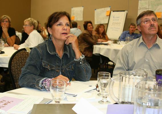 :  South Dakota State Director Elsie M. Meeks and Civil Rights Manager Jim Hafner are fully engaged in the work shop.