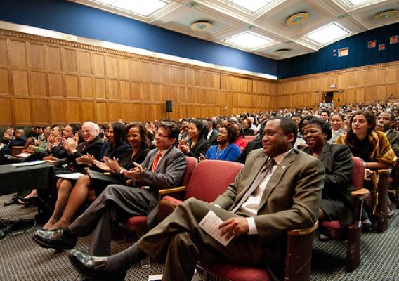 Agriculture Assistant Secretary for Civil Rights Dr. Joe Leonard (right) and an auditorium full of U.S. Department of Agriculture employees