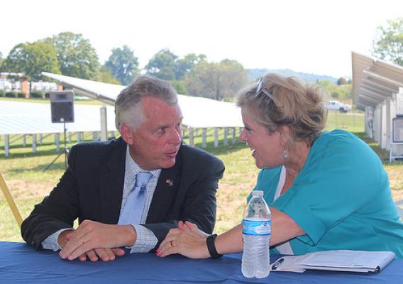 Deputy Secretary Lillian Salerno speaking with Virginia Governor Terry McAuliffe