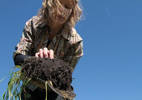 Amy Overstreet holding soil