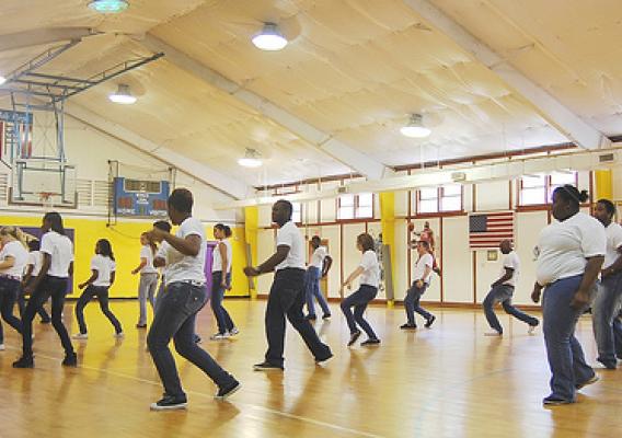 Students at the Oconaluftee Job Corps Civilian Conservation Center in Cherokee practice their choreography for a new student-produced fitness video. (Photo courtesy of Holly Krake/OJCCCC)