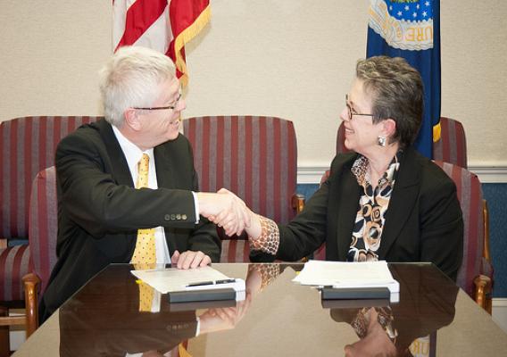 Trevor Nichols (left), Chief Executive Officer, Centre for Agricultural Bioscience CABI-Plantwise and Dr. Catherine Woteki (right), Undersecretary, Research Education and Economics signed a Memorandum of Understanding to make the United States Department of Agriculture’s research and genetic information accessible to “plant doctors” working to prevent disease and pests in developing countries at the United States Department of Agriculture in Washington, D.C., on Tuesday, February 7, 2012.