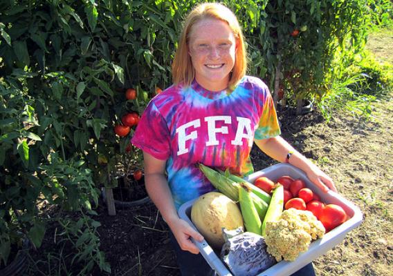 Mallory McDevitt of Wapakoneta, Ohio in her one-acre organic garden.
