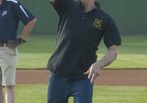 U.S. Forest Service Chief Tom Tidwell throws out the first pitch at a Potomac Nationals game to publicize the Forest Service’s “Break a Bat/Plant a Tree” partnership. U.S. Forest Service photo.