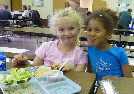 West Salem kindergarteners enjoy tacos, refried beans, Garden Bar, and grapes.