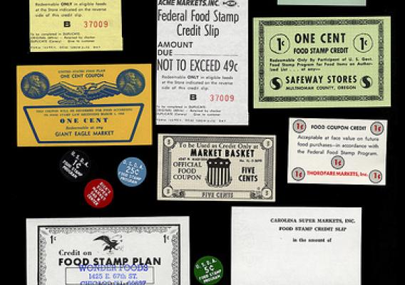 A collection of stamps and coupons from the U.S. Department of Agriculture Food Stamp Programs. Photo courtesy of Smithsonian Institution, National Museum of American History.
