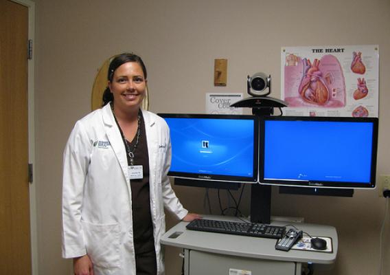 Nurse Jennifer Witting stands beside newly installed telemedicine equipment at the Aspirus Keweenaw Hospital in Laurium, MI in June 2012. The Aspirus Health Foundation, Inc. received two Distance Learning and Telemedicine (DLT) grants through the U.S. Department of Agriculture’s (USDA) Rural Development (RD) DLT Program, that enabled Aspirus to grow their Telehealth infrastructure into communities in north-central Wisconsin and the western Upper Peninsula of Michigan. USDA photo.