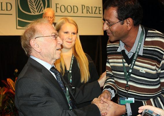 Dr. Daniel Hillel (left), winner of the 2012 World Food Prize for his pioneering work in micro-irrigation, greets Dr. Rajashekhara Rao Korada, a Borlaug Fellow from India, after the World Food Prize ceremony last month. Dr. Korada was one of 38 Borlaug Fellows from 18 countries who attended the annual Borlaug International Symposium and World Food Prize event Oct. 17-19. Since 2006, the Foreign Agricultural Service (FAS) has invited fellows to the event to meet current and former World Food Prize Laureates 