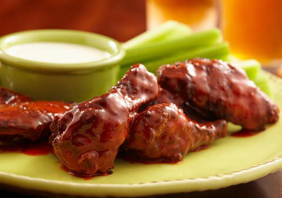 Chicken wings with celery.